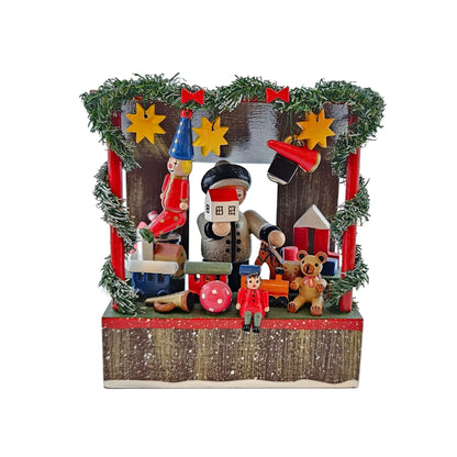 Käthe Wohlfahrt Spielwarenstand mit Händlerfigur Weihnachtsmarkt, Ansicht von vorne