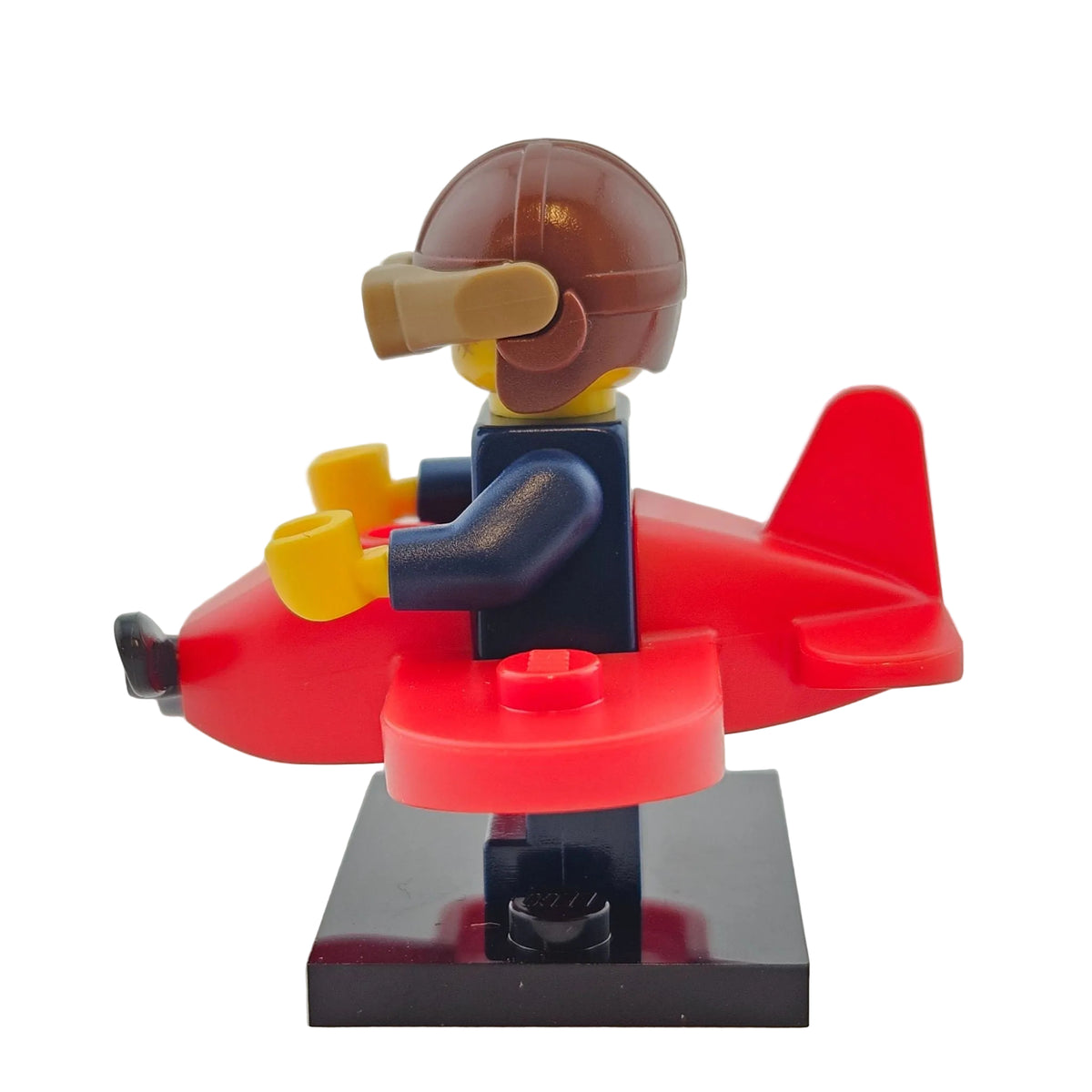 LEGO Minifigures 71029 Series 21 Minifigur Airplanegirl Mädchen mit Flugzeug Seitenansicht links